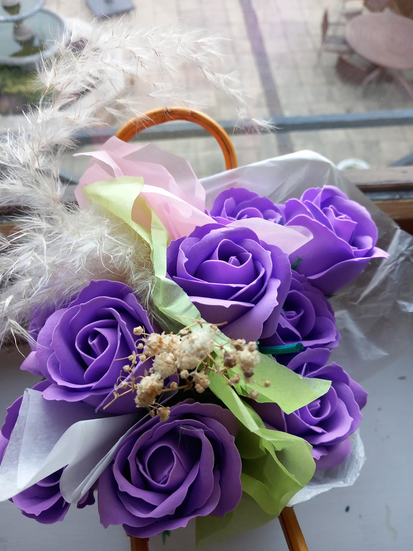PURPLE SOAP ROSES IN PINK JUTE BAG