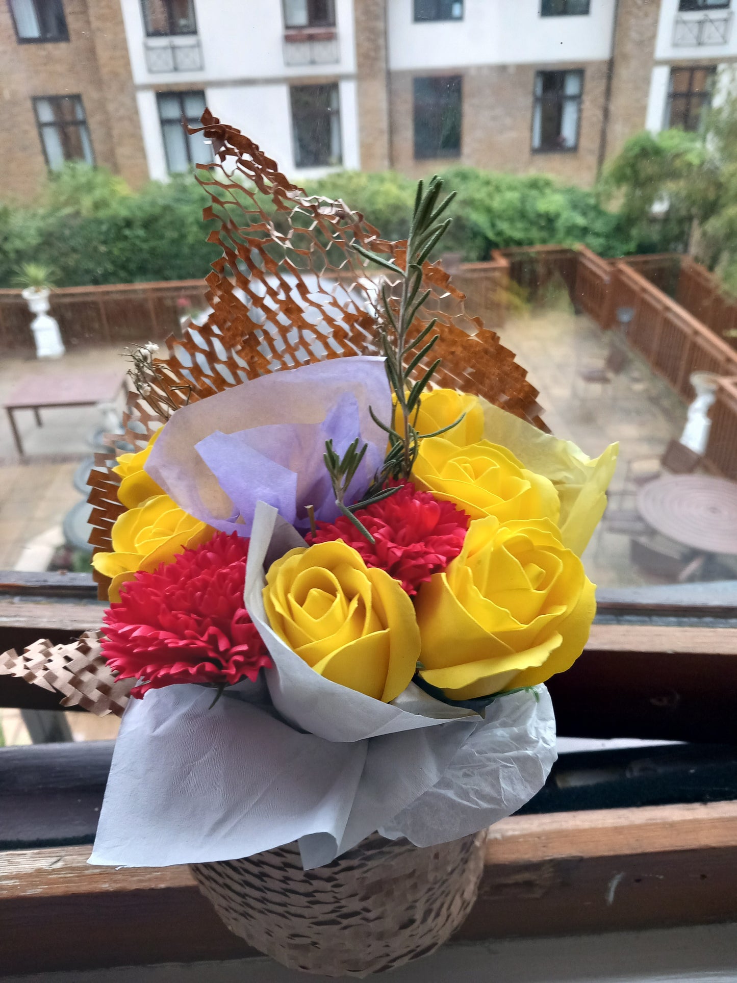 YELLOW RED FLOWER SOAP MIX IN GLASSWARE