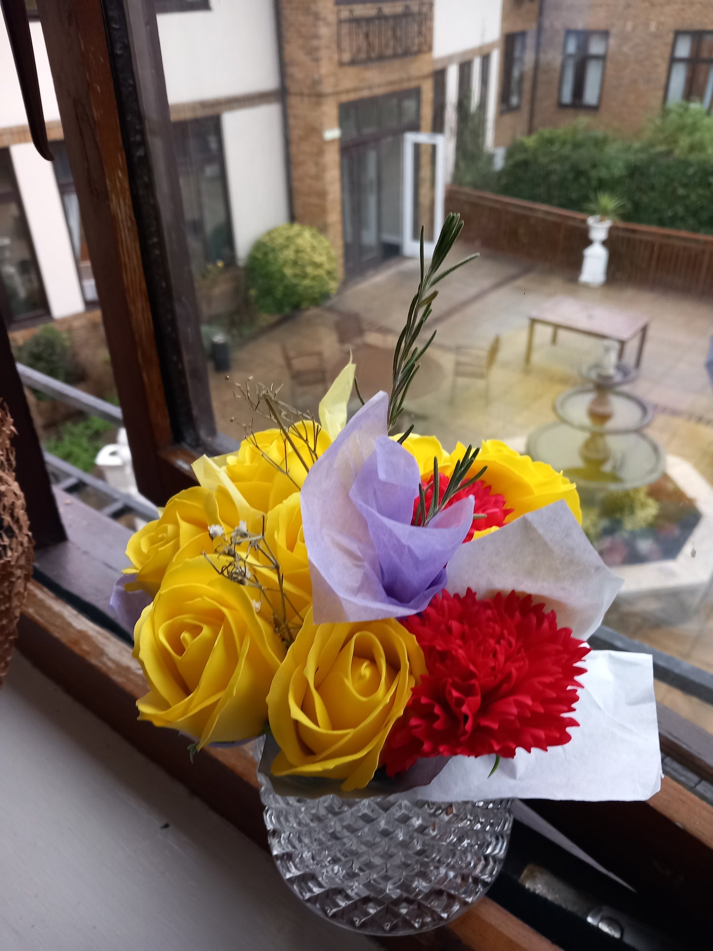 YELLOW RED FLOWER SOAP MIX IN GLASSWARE