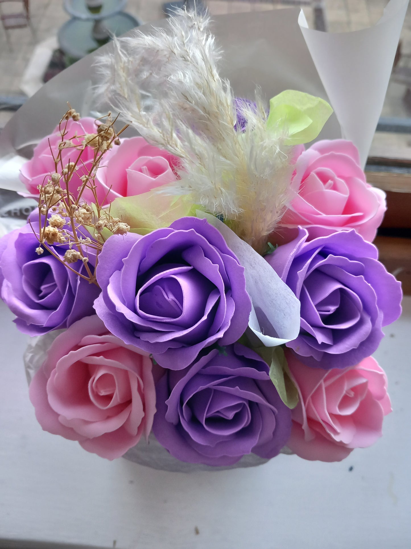 PURPLE AND PINK SOAP ROSES IN PINK JUTE BAG