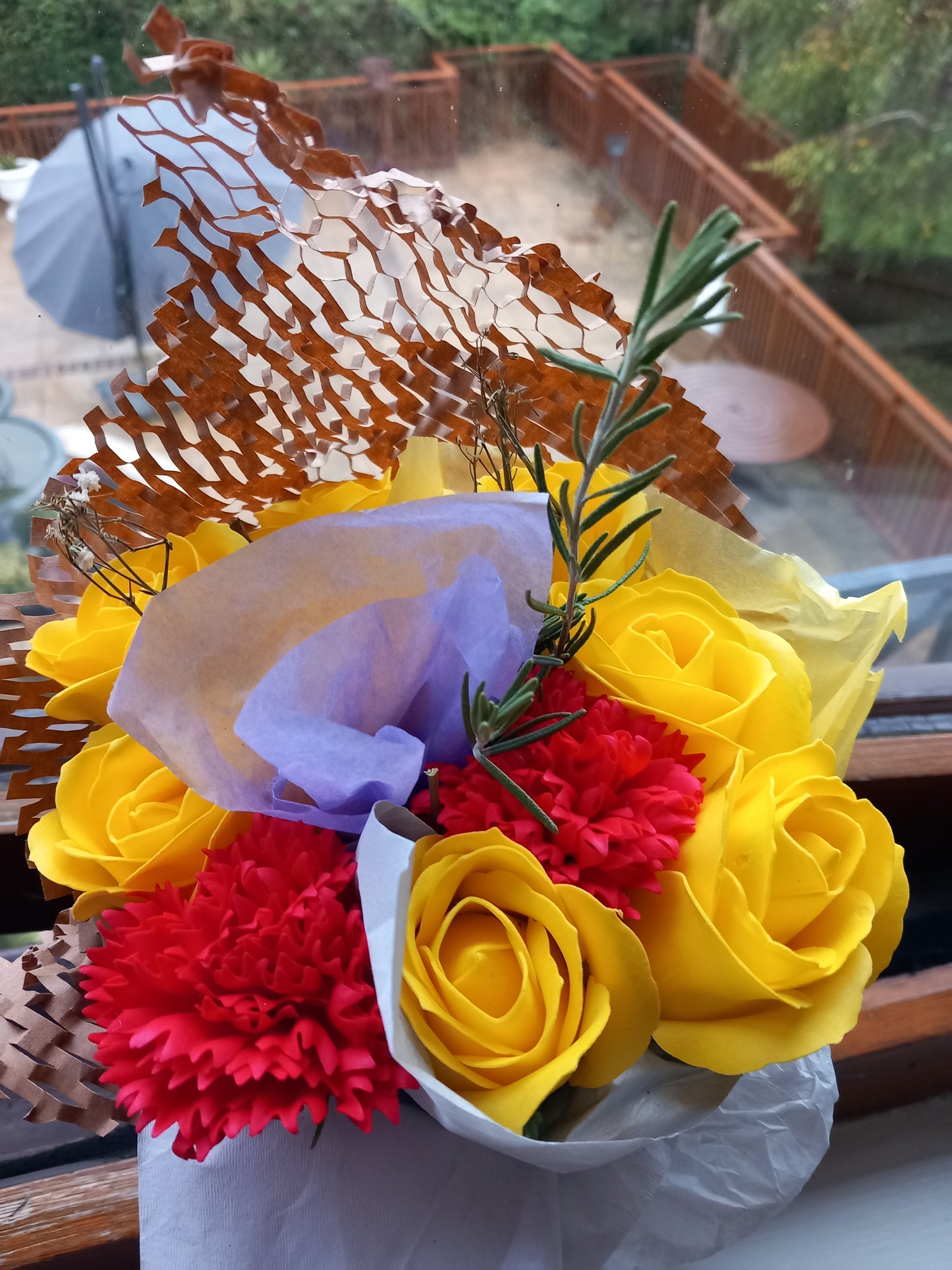 YELLOW RED FLOWER SOAP MIX IN GLASSWARE